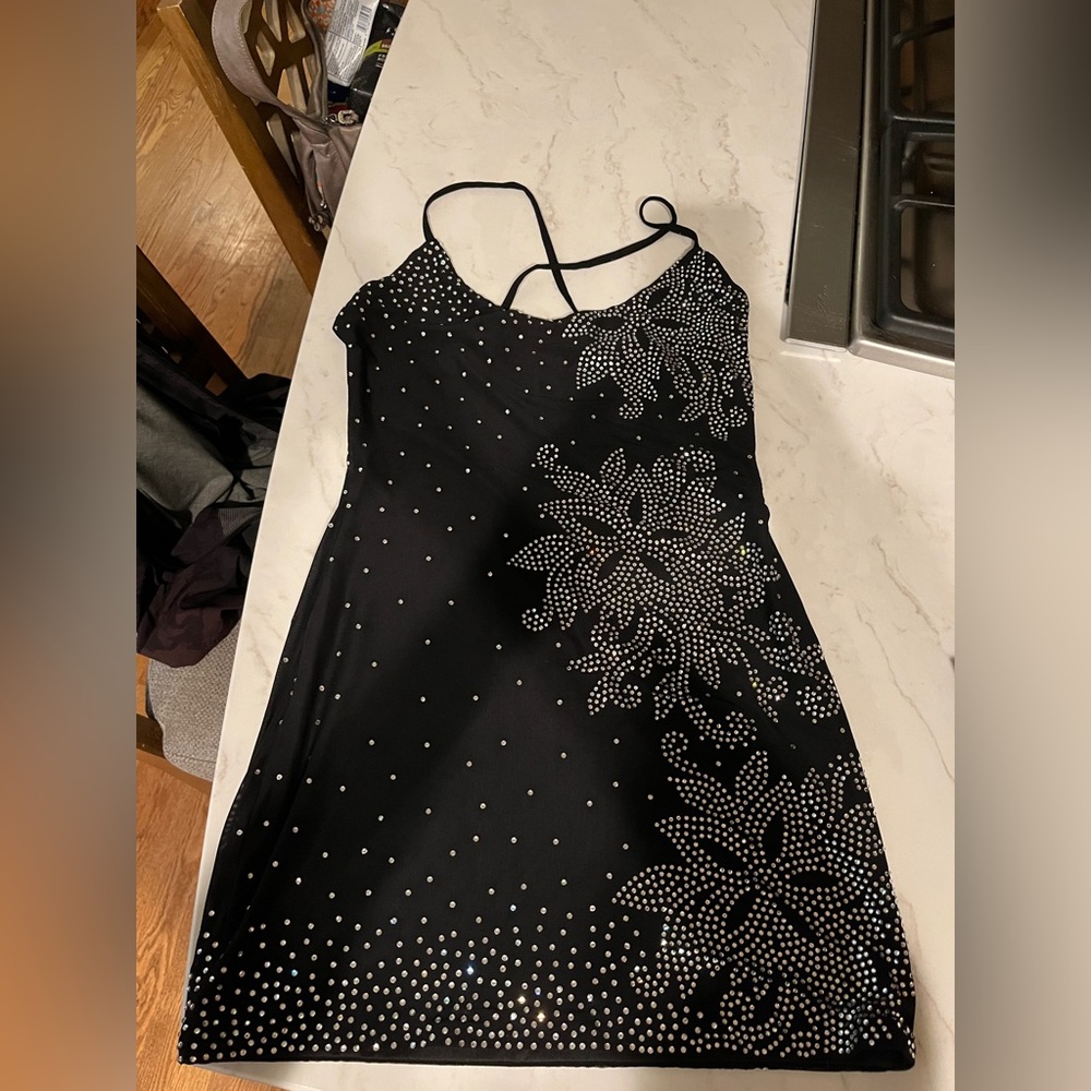 OutCast Mini Dress 
Color: Black
Size: Mediun

black, mini dress, floral pattern